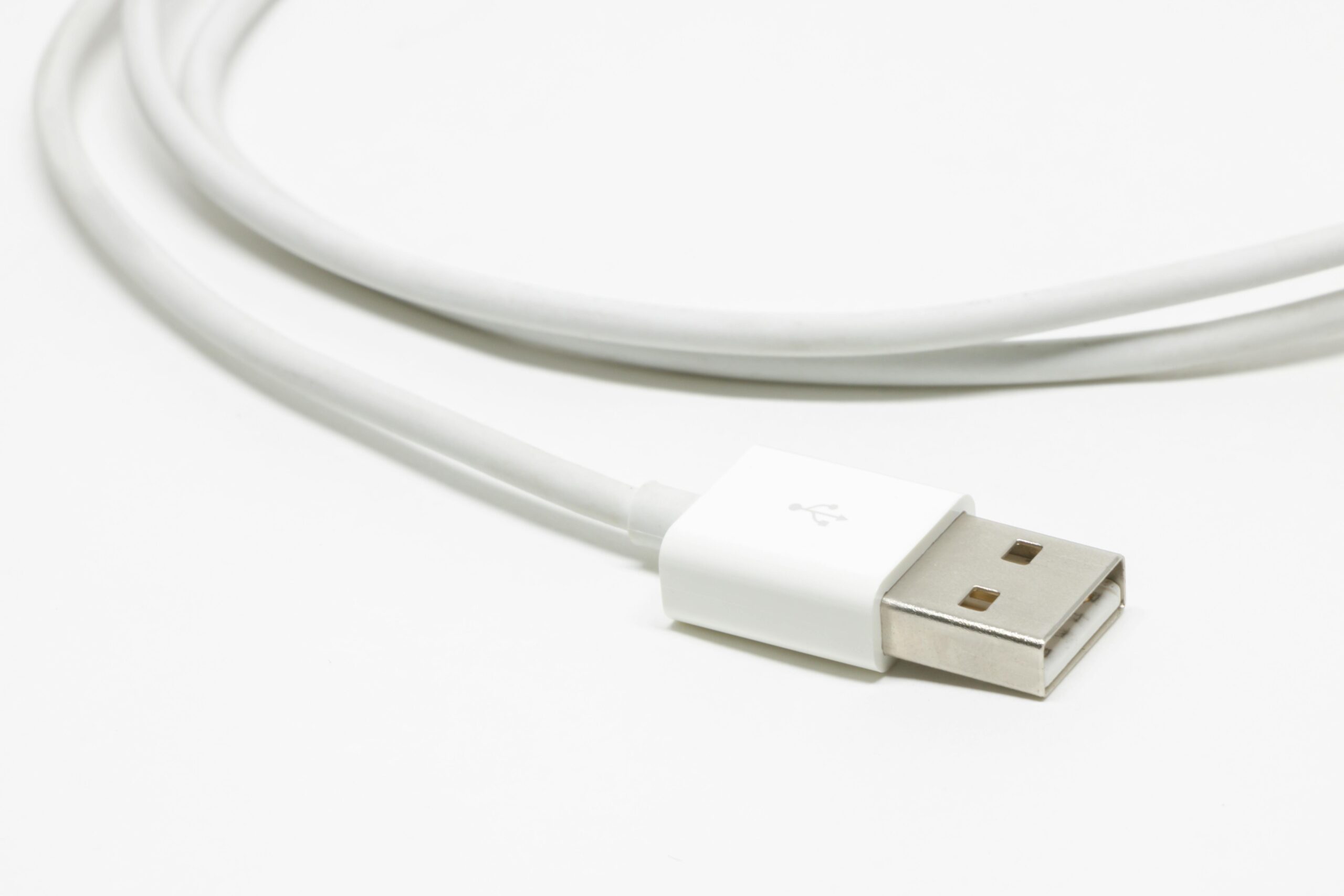 Home A detailed view of a USB cable, ideal for technology-related usage.